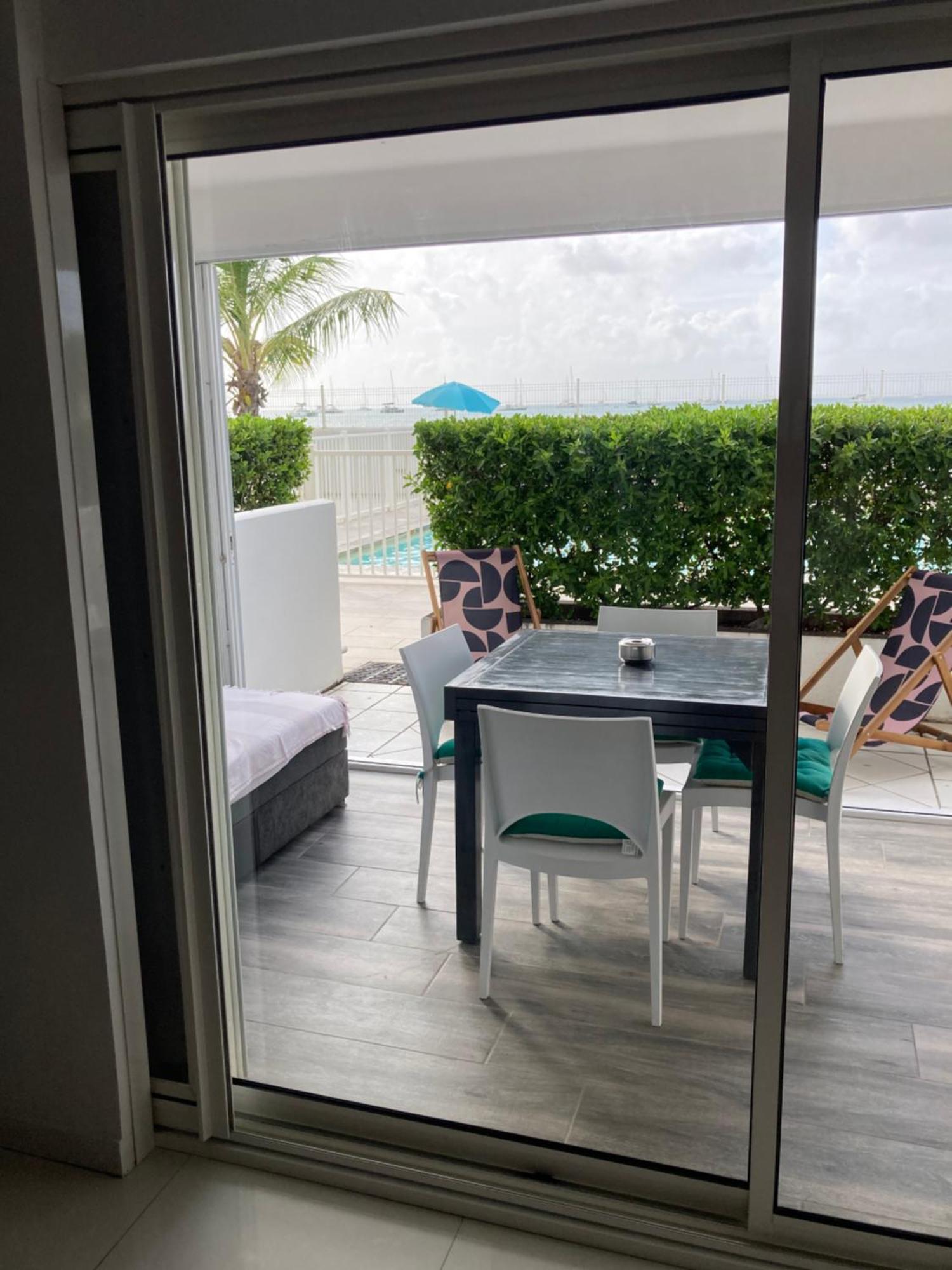 Appartement Pieds Dans L'Eau Vue Mer Acces Plage Et Piscine Marigot  Εξωτερικό φωτογραφία